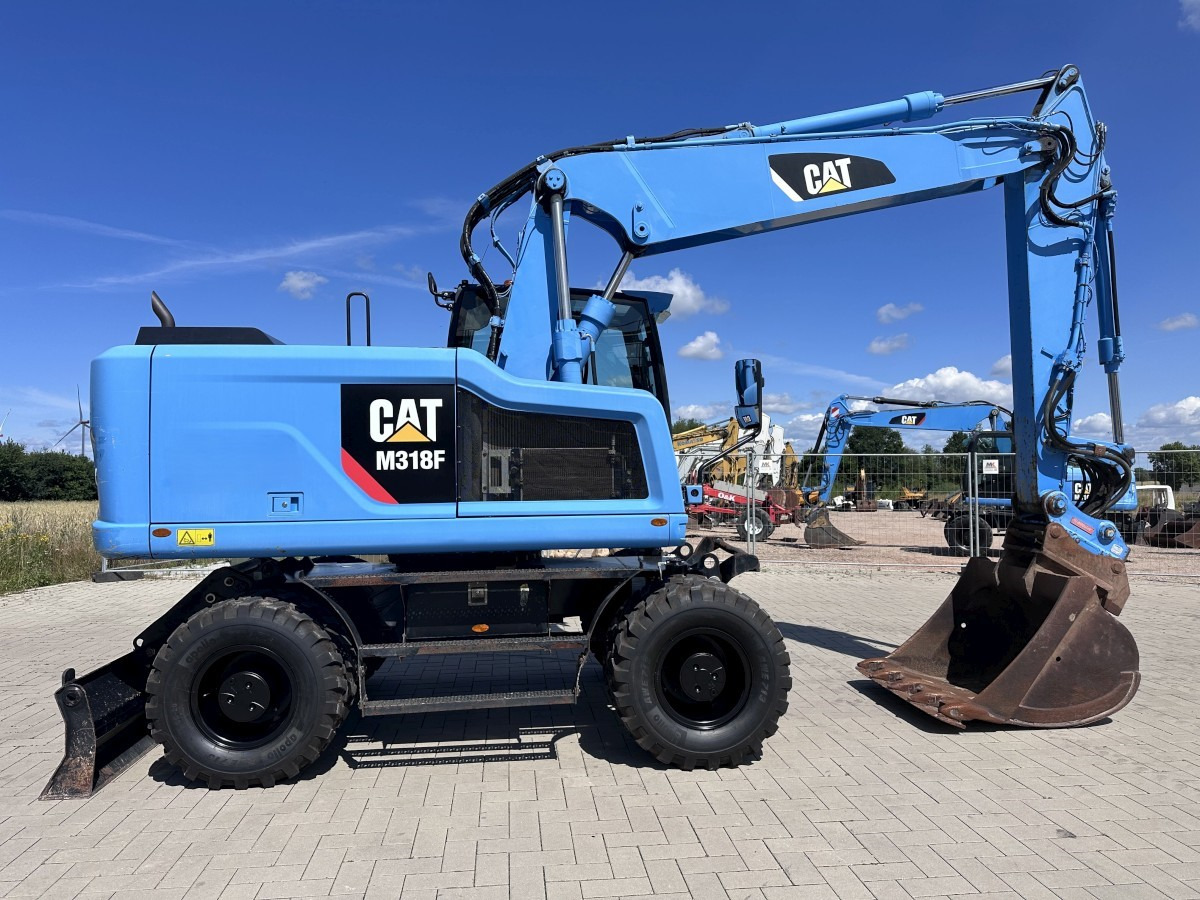 CATERPILLAR M 318 F Oil Quick OQ 65 Deutsche Maschine Top ! - Pelle sur pneus: photos 2 CATERPILLAR M 318 F Oil Quick OQ 65 Deutsche Maschine Top ! - Pelle sur pneus: photos 2