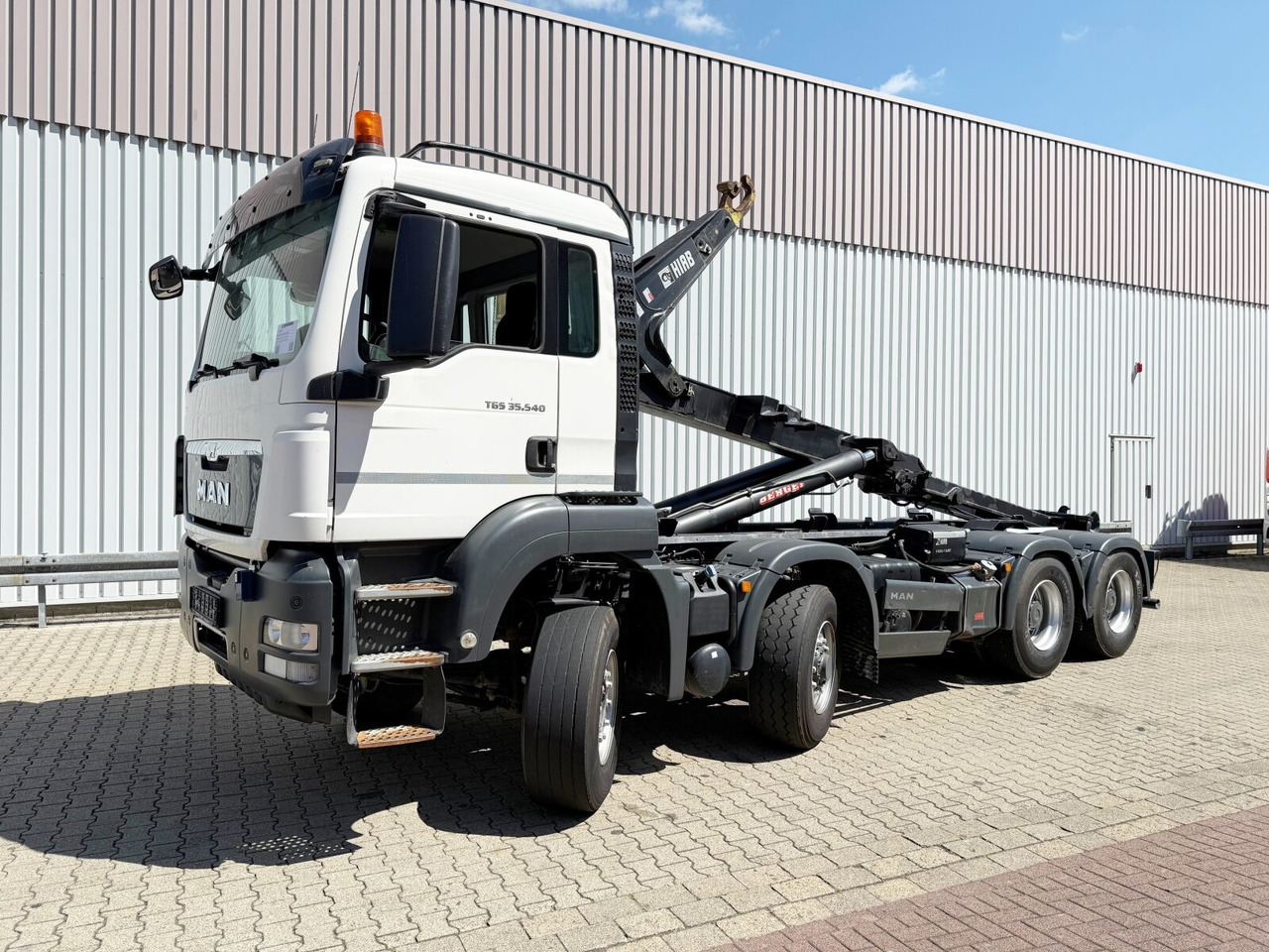 MAN TGS 35.540 8x6H BL TGS 35.540 8x6H BL, HydroDrive, PriTrader, Hiab Abrollkipper bis 7 m - Camion ampliroll: photos 1 MAN TGS 35.540 8x6H BL TGS 35.540 8x6H BL, HydroDrive, PriTrader, Hiab Abrollkipper bis 7 m - Camion ampliroll: photos 1
