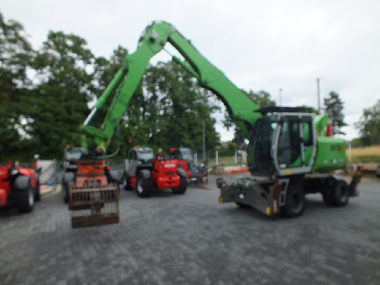 SENNEBOGEN 817E - Pelle de manutention pour Engins de chantier: photos 1 SENNEBOGEN 817E - Pelle de manutention pour Engins de chantier: photos 1