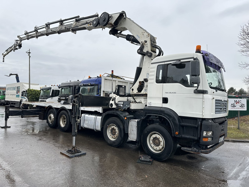 MAN TGA 35.430 8x2 + CRANE HIAB 700 E-6 + JIB 165X-3 - RETARDER - PLATFORM 6m70~8m50 EXTENDABLE - MANUAL GEARBOX ZF - LIFT + STEERING AXLE - Camion grue: photos 1 MAN TGA 35.430 8x2 + CRANE HIAB 700 E-6 + JIB 165X-3 - RETARDER - PLATFORM 6m70~8m50 EXTENDABLE - MANUAL GEARBOX ZF - LIFT + STEERING AXLE - Camion grue: photos 1