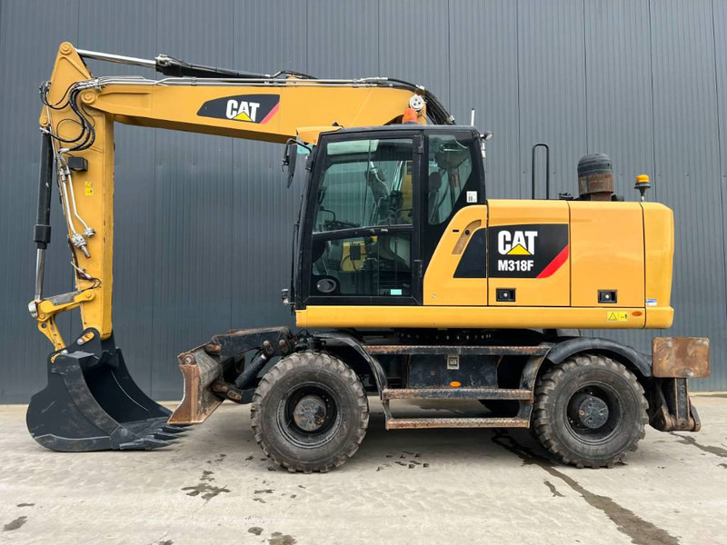 Cat M318F - Pelle sur pneus: photos 5 Cat M318F - Pelle sur pneus: photos 5