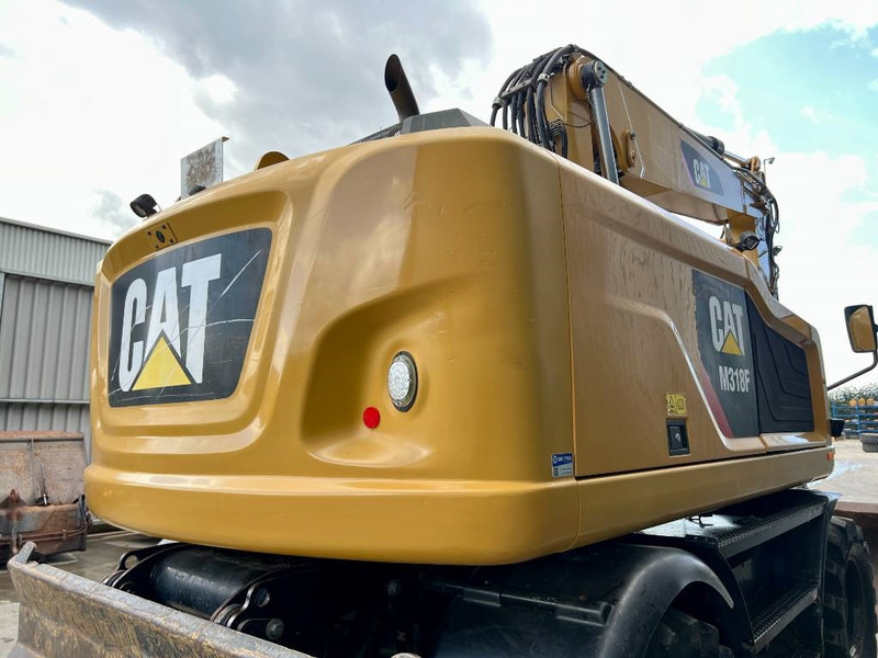 Cat M318F - Pelle sur pneus: photos 5 Cat M318F - Pelle sur pneus: photos 5