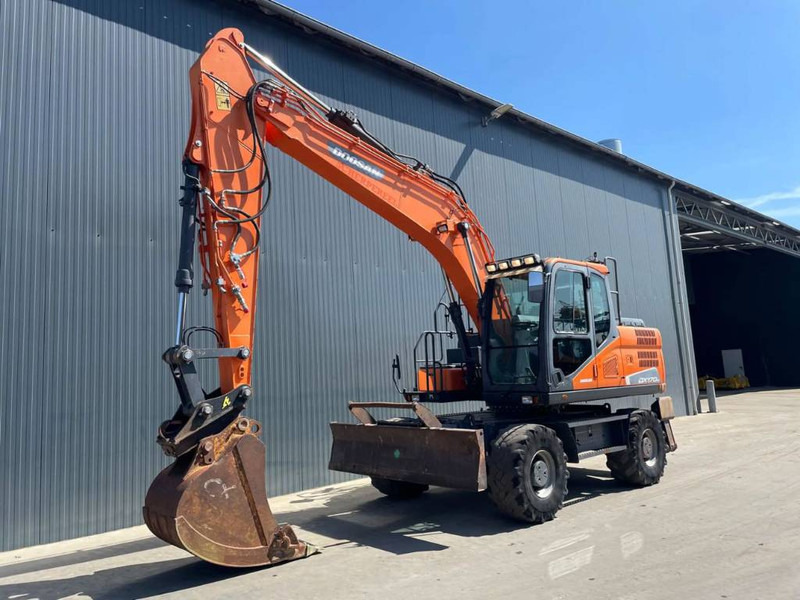 Doosan DX170W-5 - Pelle sur pneus: photos 1 Doosan DX170W-5 - Pelle sur pneus: photos 1