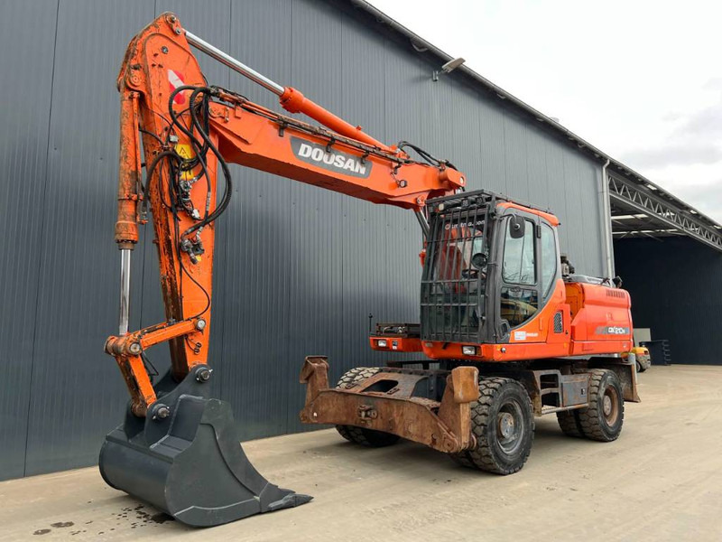 Pelle sur pneus Doosan DX210W: photos 1