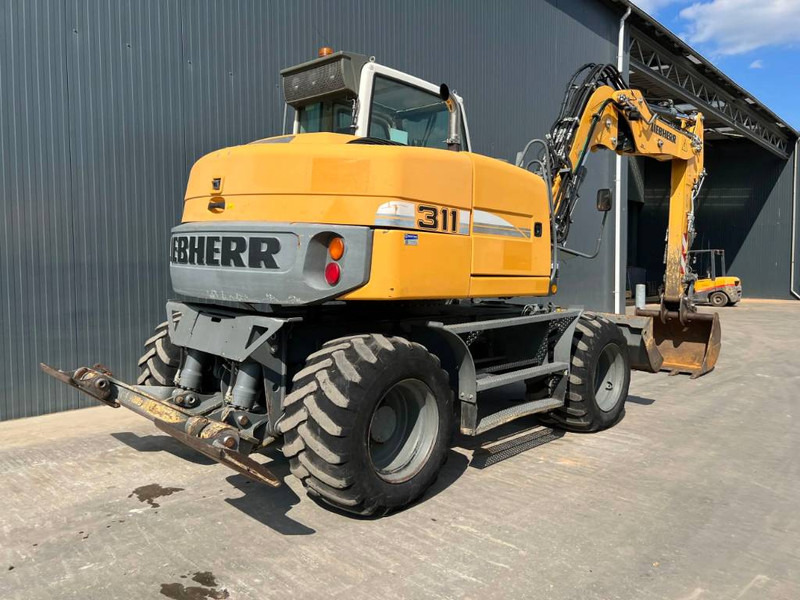 Liebherr A311 Litronic - Pelle sur pneus: photos 4 Liebherr A311 Litronic - Pelle sur pneus: photos 4