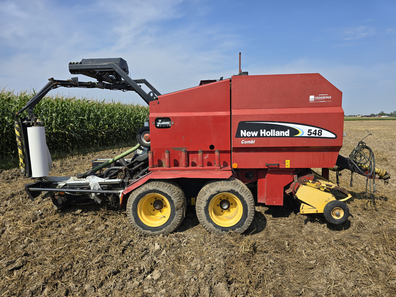 NEW HOLLAND 548 Combi - Presse à balles rondes: photos 1 NEW HOLLAND 548 Combi - Presse à balles rondes: photos 1