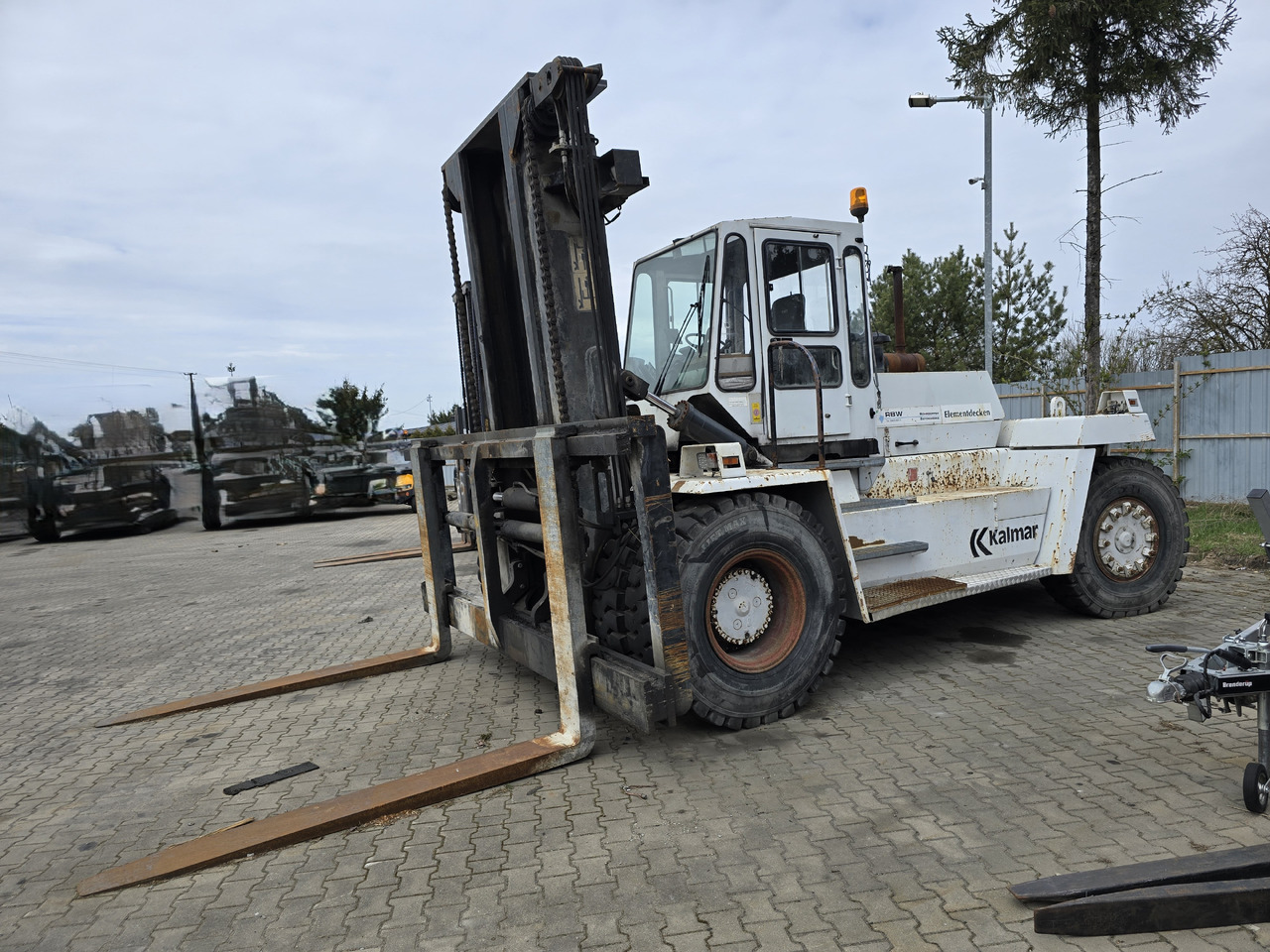 Kalmar DC18-1200N LB - Chariot porte-conteneur: photos 1 Kalmar DC18-1200N LB - Chariot porte-conteneur: photos 1