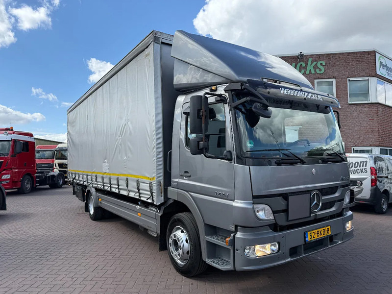 Mercedes-Benz Atego 1224 Atego 1224L 4X2 Schaltgetriebe / Schiebeplane + LBW / Euro5 / Holland Truck - Camion à rideaux coulissants: photos 1 Mercedes-Benz Atego 1224 Atego 1224L 4X2 Schaltgetriebe / Schiebeplane + LBW / Euro5 / Holland Truck - Camion à rideaux coulissants: photos 1