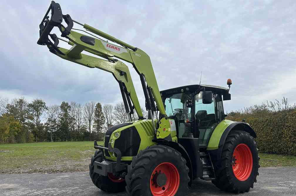 Claas Arion 640 cis, lucht, frontlader - Tracteur agricole: photos 1 Claas Arion 640 cis, lucht, frontlader - Tracteur agricole: photos 1