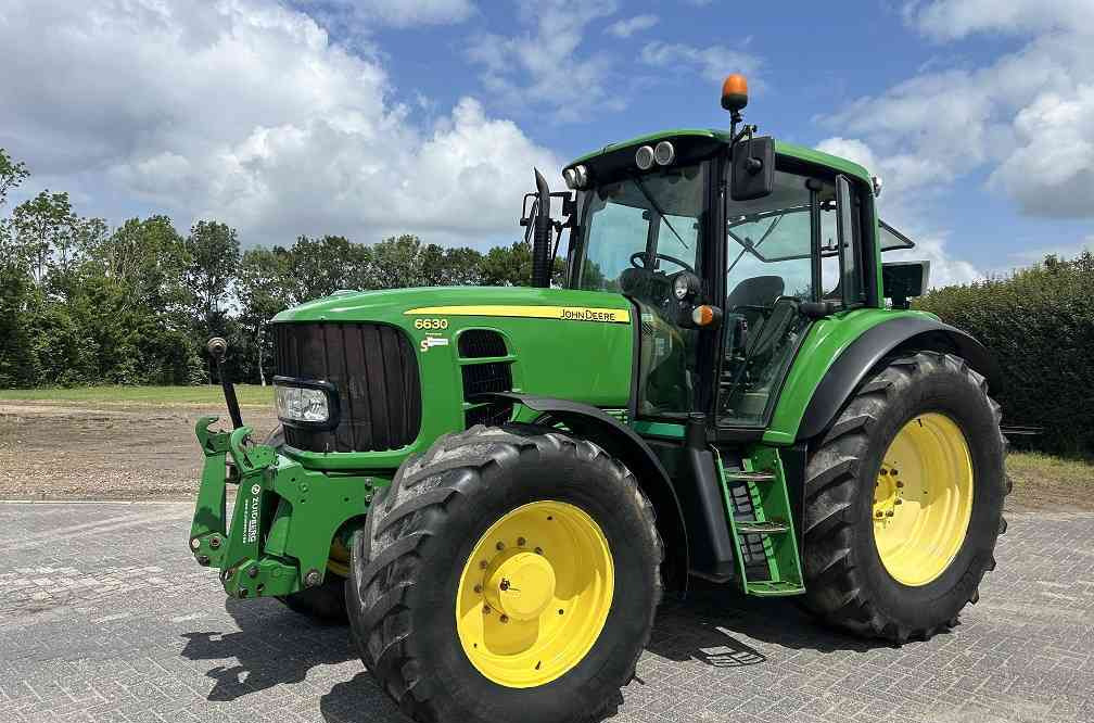 John Deere 6630 premium, tls, powerquad - Tracteur agricole: photos 1 John Deere 6630 premium, tls, powerquad - Tracteur agricole: photos 1
