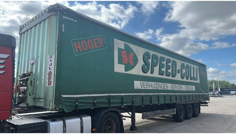 Krone SDP27 (BPW AXLES / DISC BRAKES / BELGIAN TRAILER / GOOD TYRES) - Semi-remorque rideaux coulissants: photos 1 Krone SDP27 (BPW AXLES / DISC BRAKES / BELGIAN TRAILER / GOOD TYRES) - Semi-remorque rideaux coulissants: photos 1