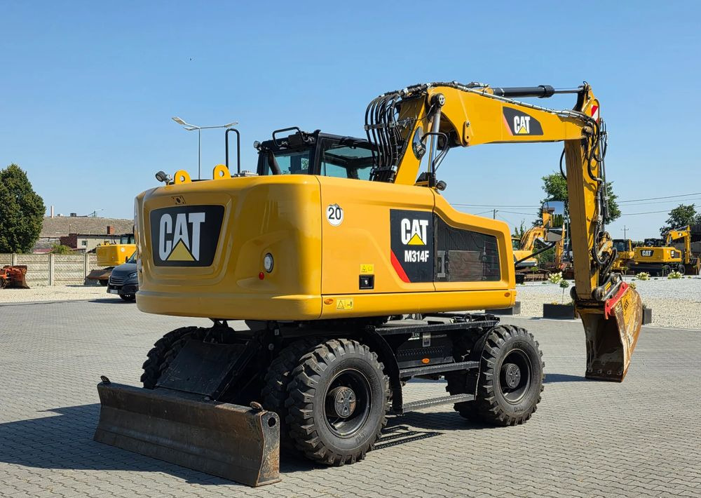 Caterpillar M314F, 2019 ROK, 3300 MTH, OIL QUICK OQ 65 - Pelle sur pneus: photos 5 Caterpillar M314F, 2019 ROK, 3300 MTH, OIL QUICK OQ 65 - Pelle sur pneus: photos 5
