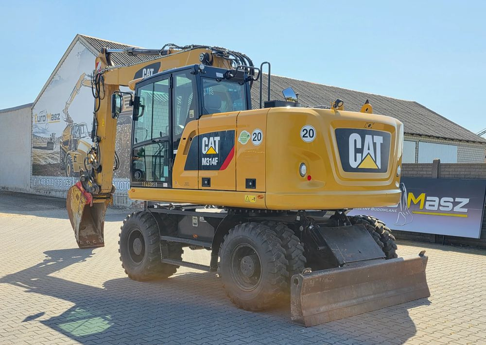 Caterpillar M314F, 2019 ROK, 3300 MTH, OIL QUICK OQ 65 - Pelle sur pneus: photos 3 Caterpillar M314F, 2019 ROK, 3300 MTH, OIL QUICK OQ 65 - Pelle sur pneus: photos 3