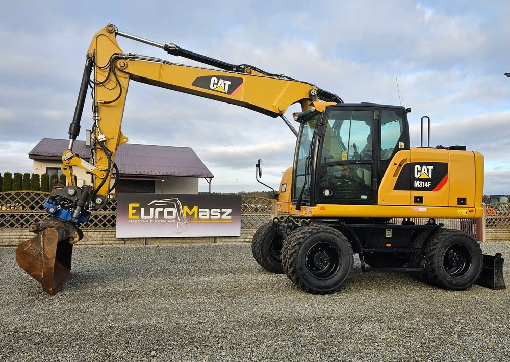 Caterpillar M314F, 2019 ROK, 5600 MTH, GŁOWICA SMP - Pelle sur pneus: photos 1 Caterpillar M314F, 2019 ROK, 5600 MTH, GŁOWICA SMP - Pelle sur pneus: photos 1