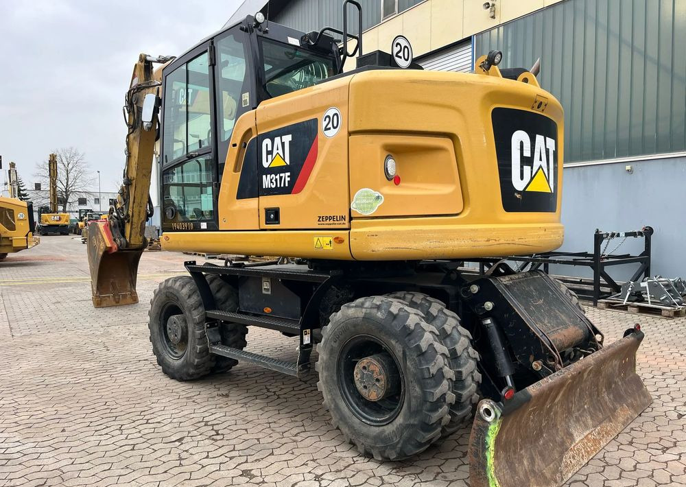 Caterpillar M317F, 2019 ROK, 5100 MTH, OIL QUICK - Pelle sur pneus: photos 3 Caterpillar M317F, 2019 ROK, 5100 MTH, OIL QUICK - Pelle sur pneus: photos 3