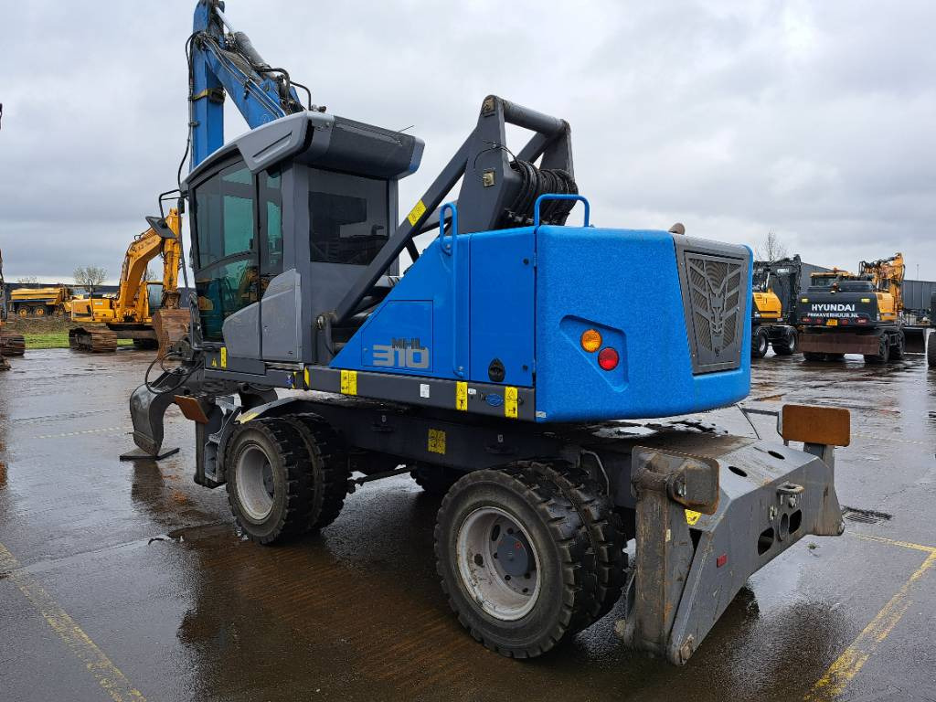 Fuchs MHL310F + Grapple - Pelle de manutention: photos 5 Fuchs MHL310F + Grapple - Pelle de manutention: photos 5