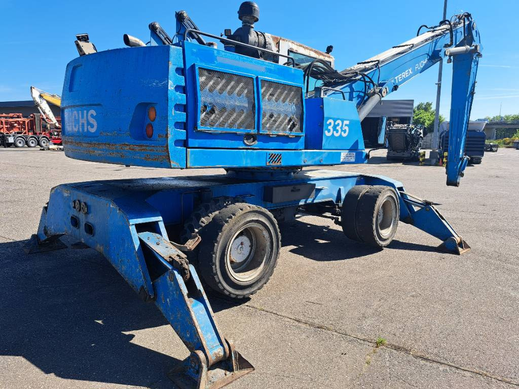 Fuchs MHL335 + Grapple + Reman Engine - Pelle de manutention: photos 5 Fuchs MHL335 + Grapple + Reman Engine - Pelle de manutention: photos 5