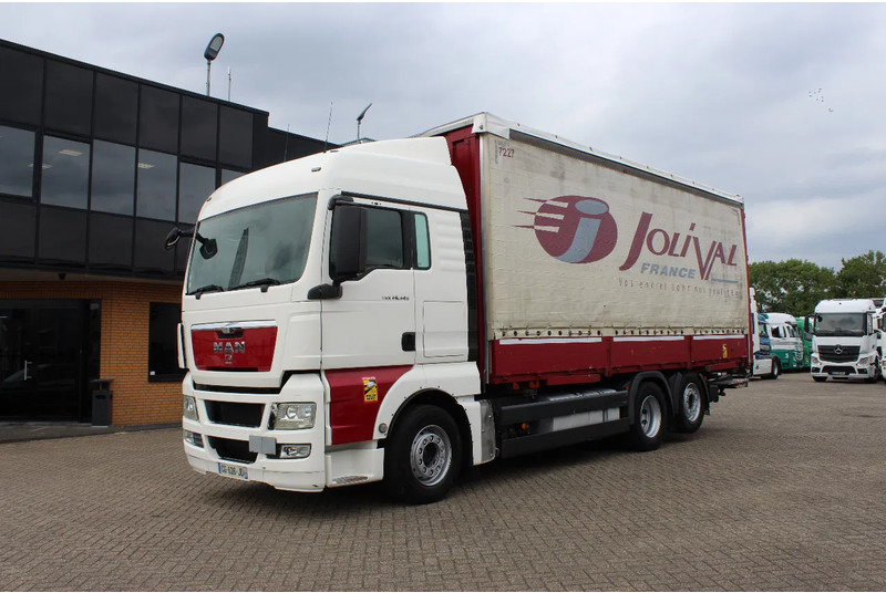 MAN TGX 26.440 * EURO5 * 6X2 * LIFT AXLE * - Camion à rideaux coulissants: photos 2 MAN TGX 26.440 * EURO5 * 6X2 * LIFT AXLE * - Camion à rideaux coulissants: photos 2