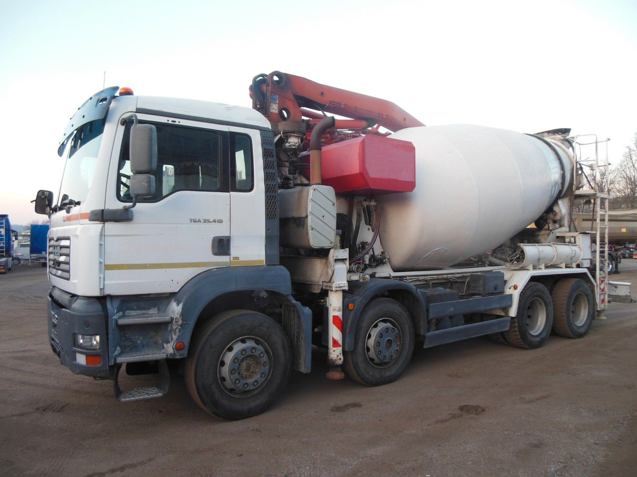 MAN TGA 35.410, 8X4, MIX + PUMPE 24M - Camion pompe: photos 1 MAN TGA 35.410, 8X4, MIX + PUMPE 24M - Camion pompe: photos 1