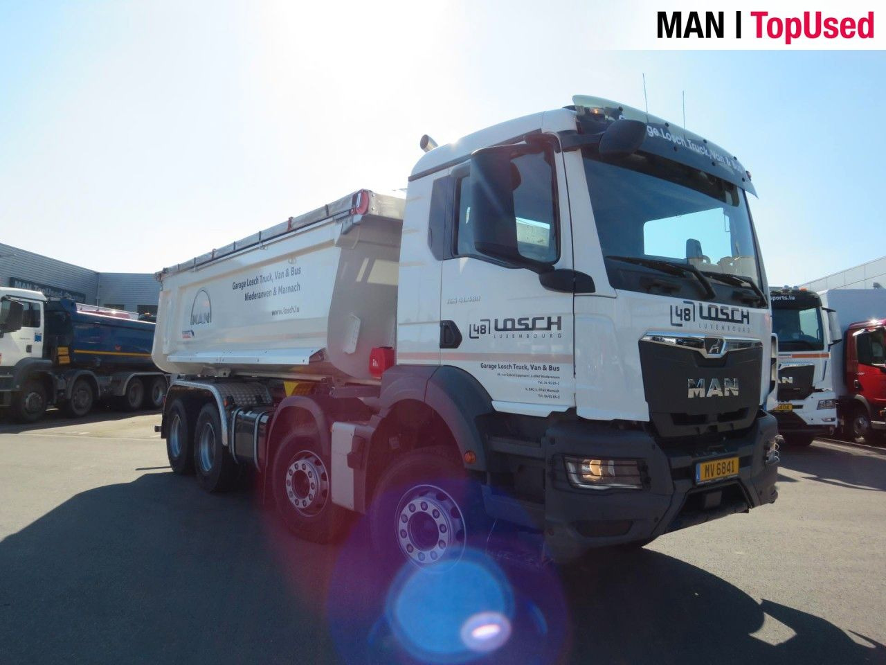 Camion multibenne MAN TGS 41.480 8x4 BB CH Schmitz Muldenkipper: photos 7