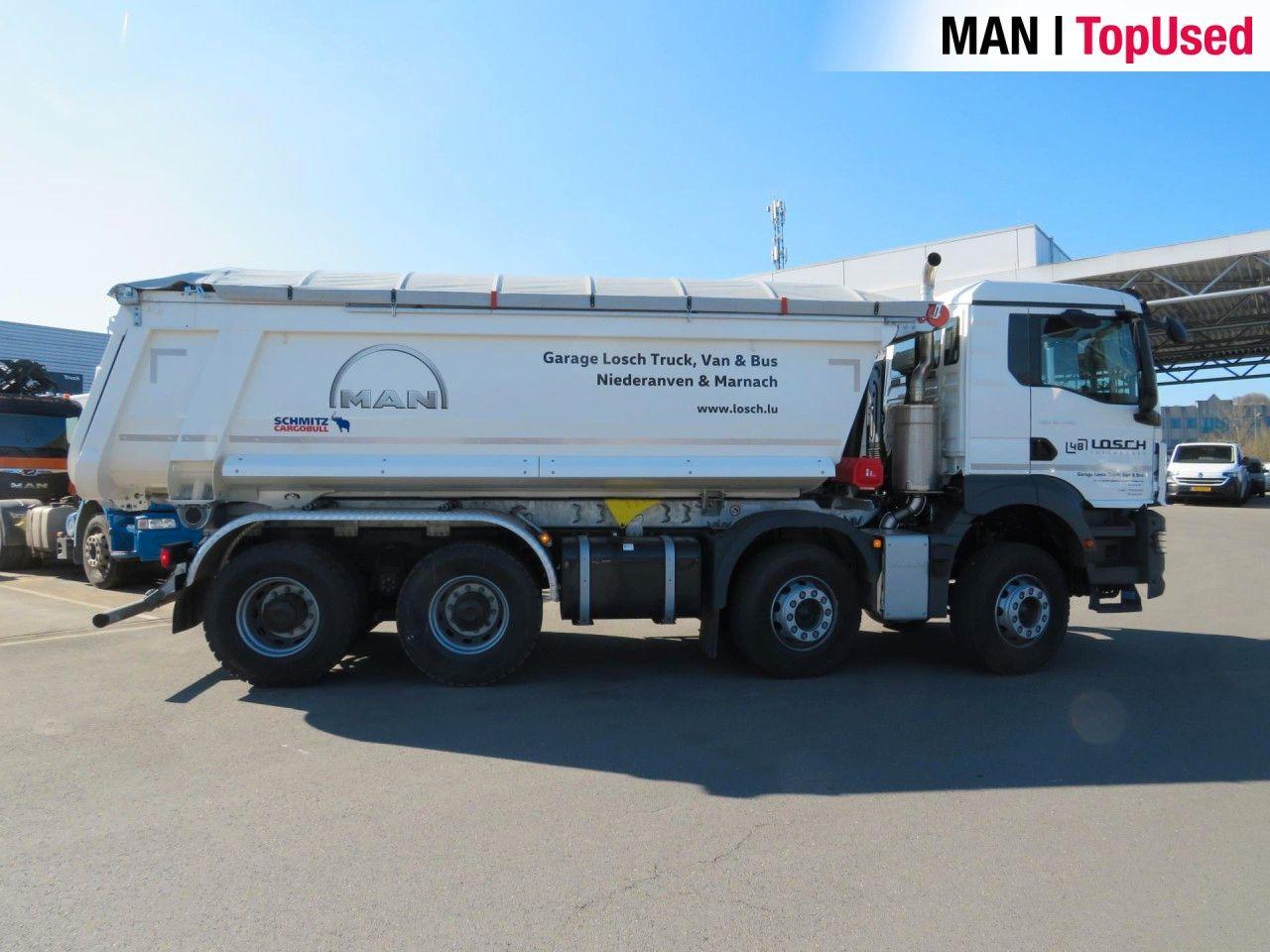 Camion multibenne MAN TGS 41.480 8x4 BB CH Schmitz Muldenkipper: photos 6