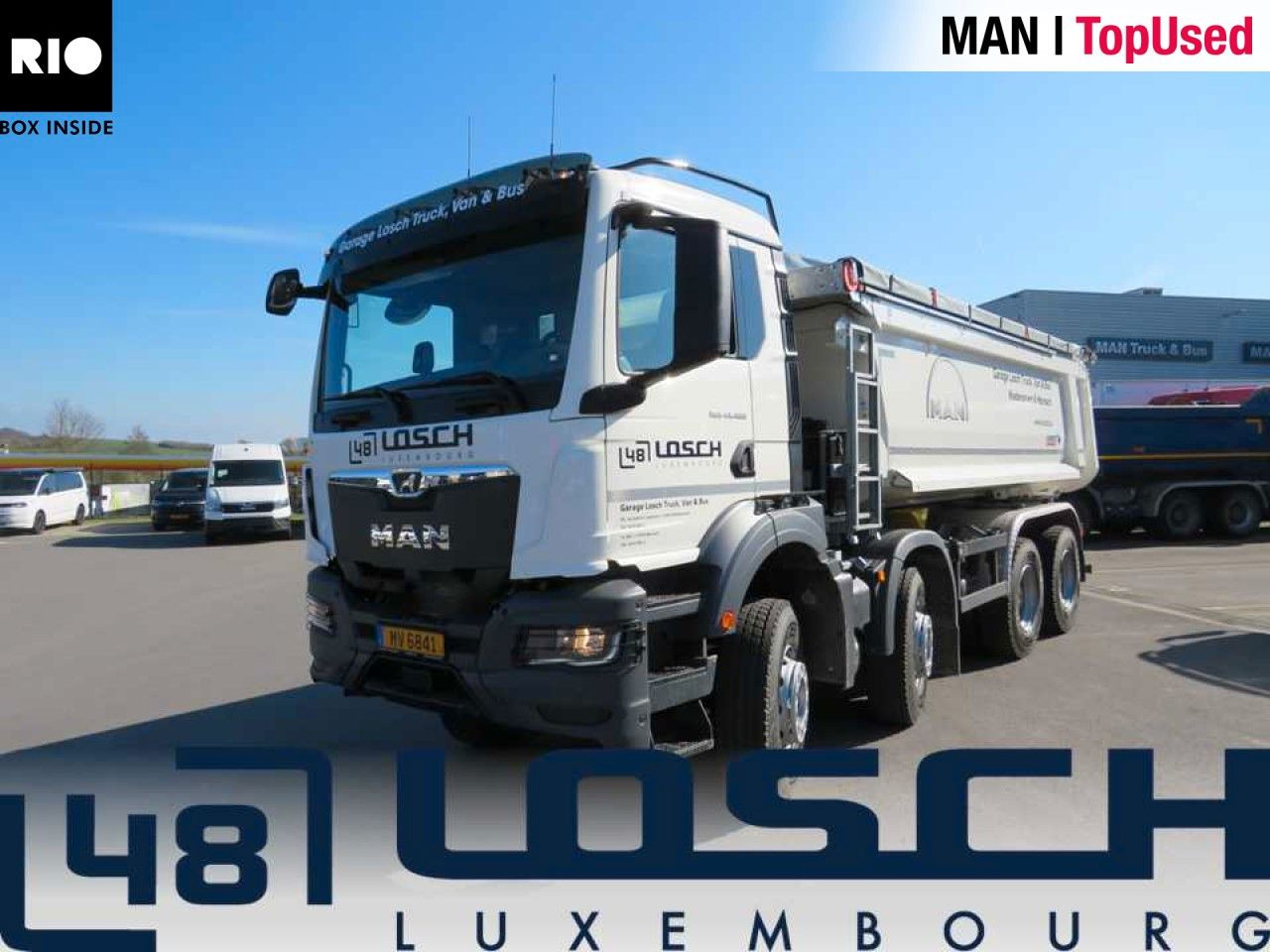 MAN TGS 41.480 8x4 BB CH Schmitz Muldenkipper - Camion multibenne: photos 1 MAN TGS 41.480 8x4 BB CH Schmitz Muldenkipper - Camion multibenne: photos 1