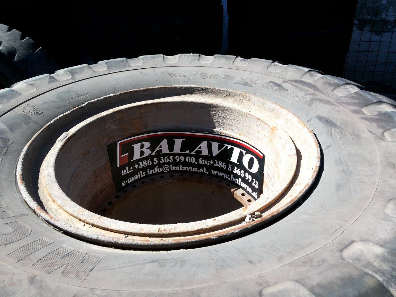 Caterpillar 988B - Roue complète pour Engins de chantier: photos 1 Caterpillar 988B - Roue complète pour Engins de chantier: photos 1