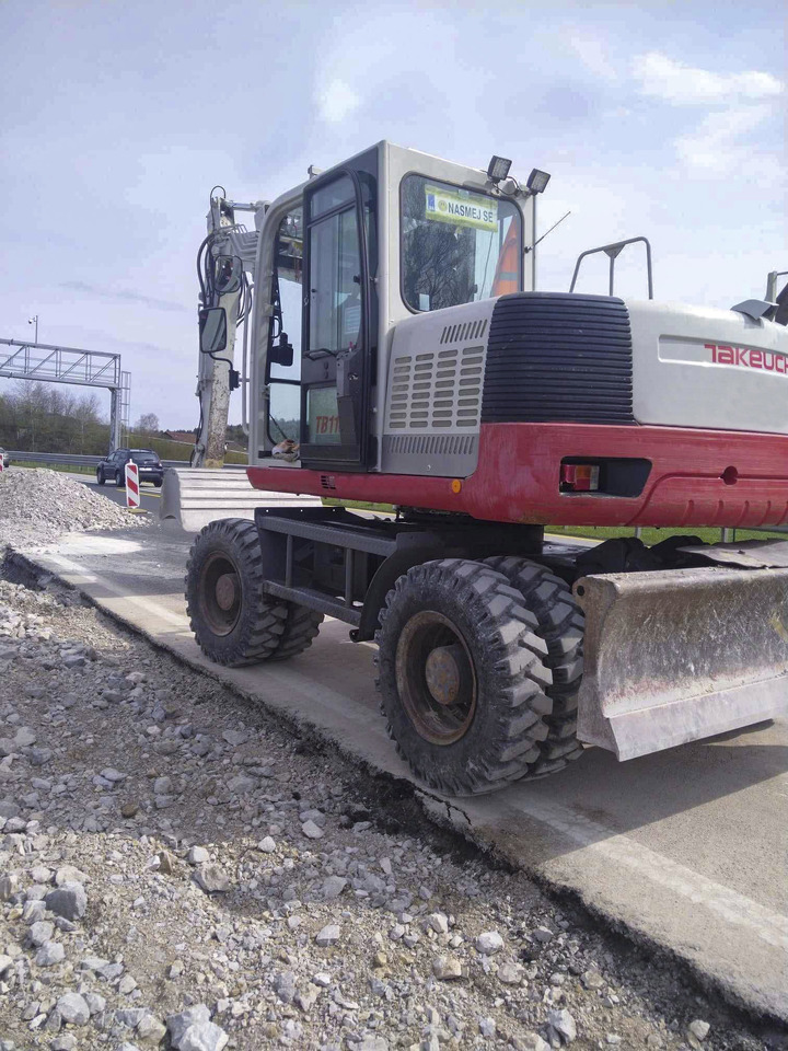 Takeuchi TB1160W - Pelle sur pneus: photos 4 Takeuchi TB1160W - Pelle sur pneus: photos 4