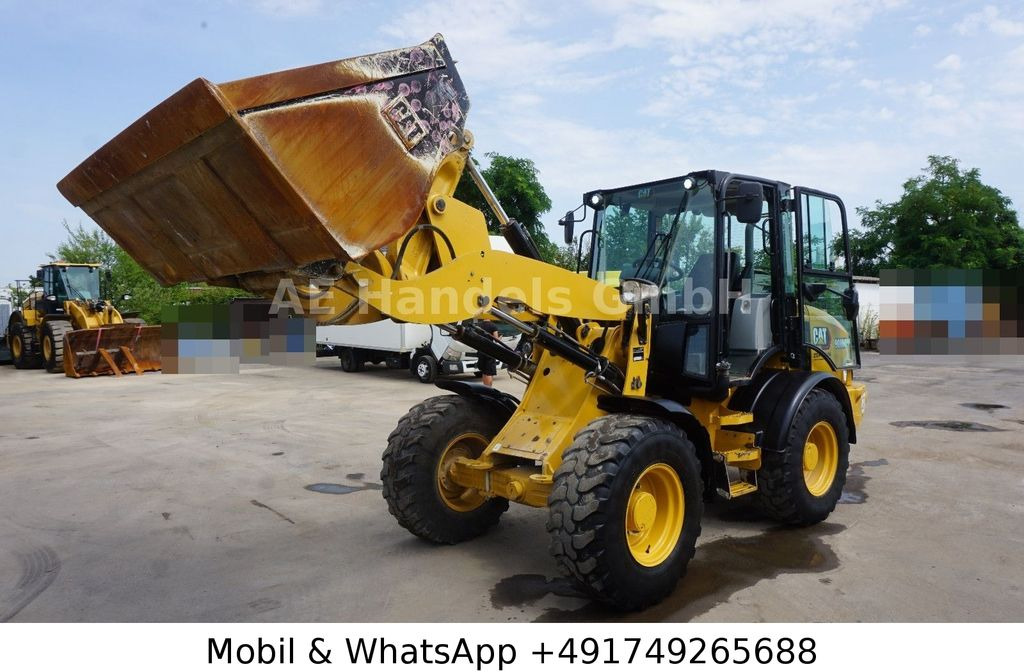 CAT 908 M *Schaufel/Gabel/Schnellwechsler - Chargeuse sur pneus: photos 1 CAT 908 M *Schaufel/Gabel/Schnellwechsler - Chargeuse sur pneus: photos 1