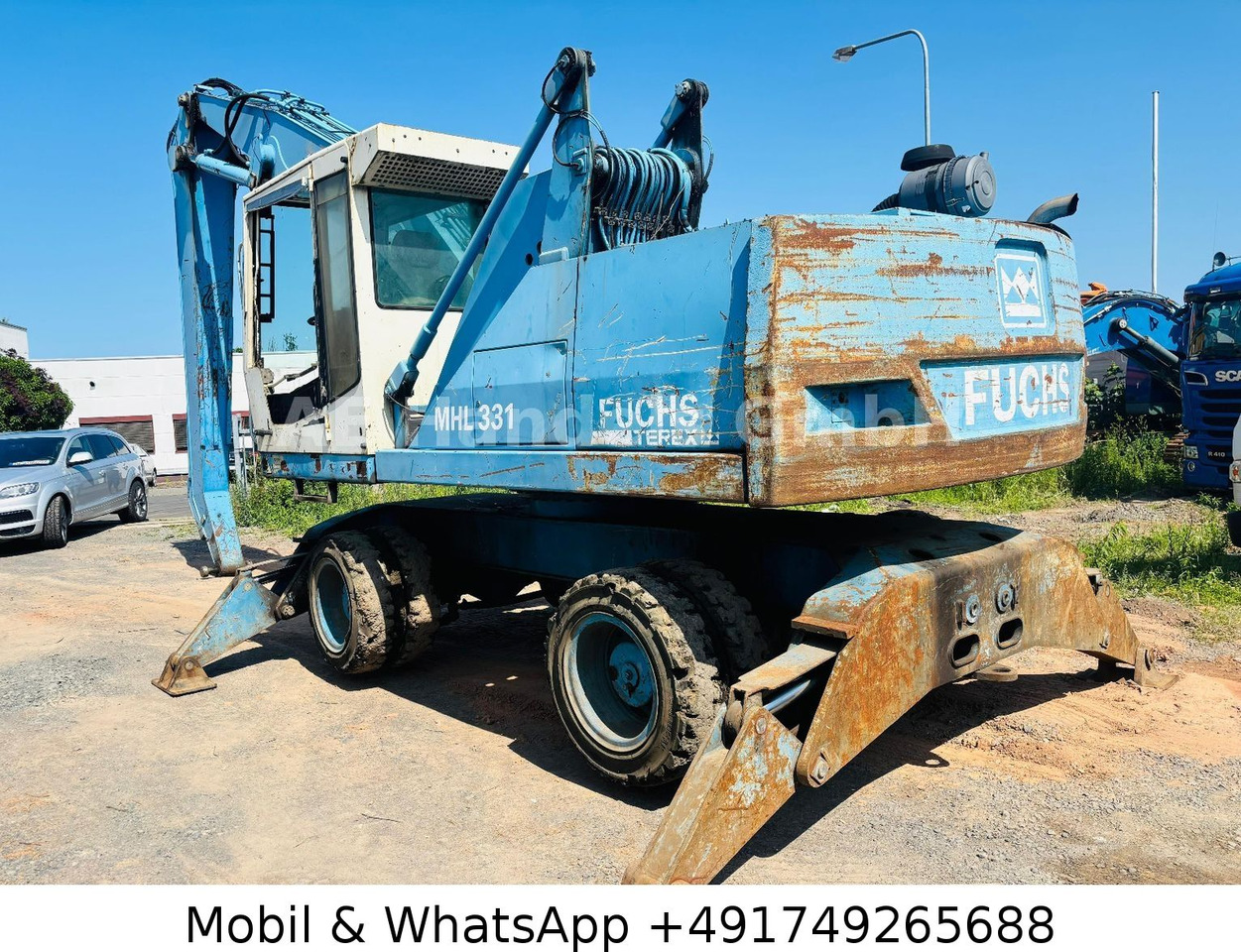 Terex MHL 331 Umschlagbagger - Pelle sur pneus: photos 5 Terex MHL 331 Umschlagbagger - Pelle sur pneus: photos 5