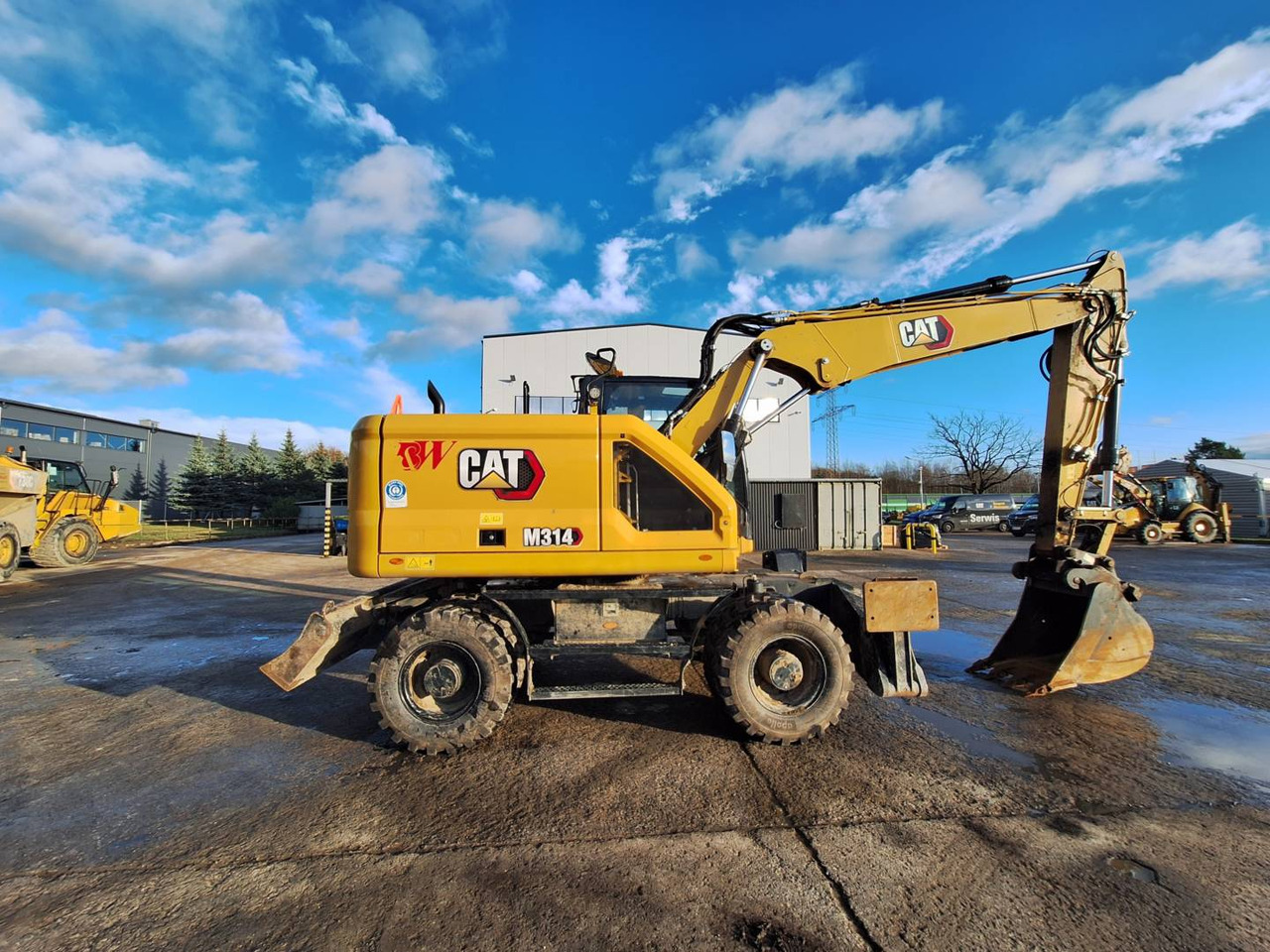 Pelle sur pneus CAT M 314: photos 10