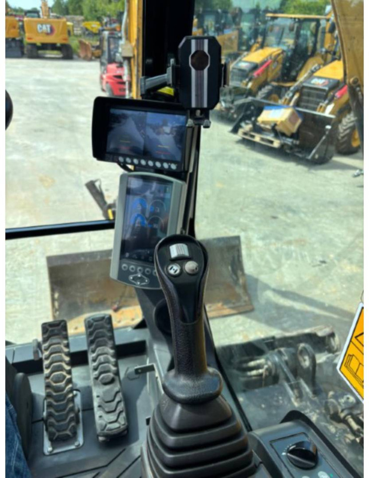 Pelle sur pneus CAT M315F: photos 14 Pelle sur pneus CAT M315F: photos 14