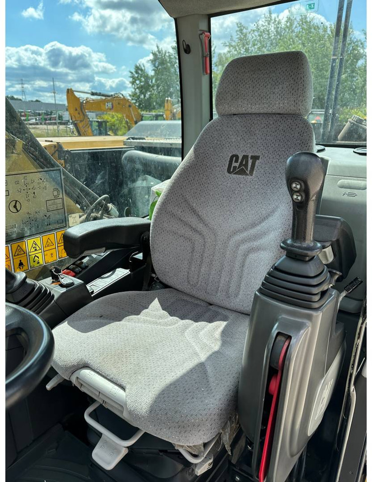 Pelle sur pneus CAT M318F: photos 12