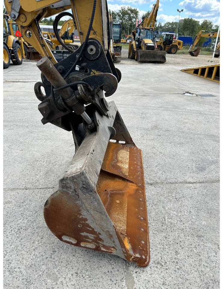 Pelle sur pneus CAT M318F: photos 21