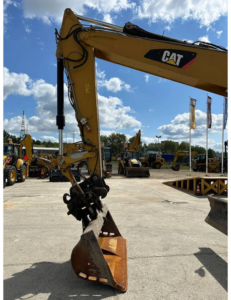 Pelle sur pneus CAT M318F: photos 17