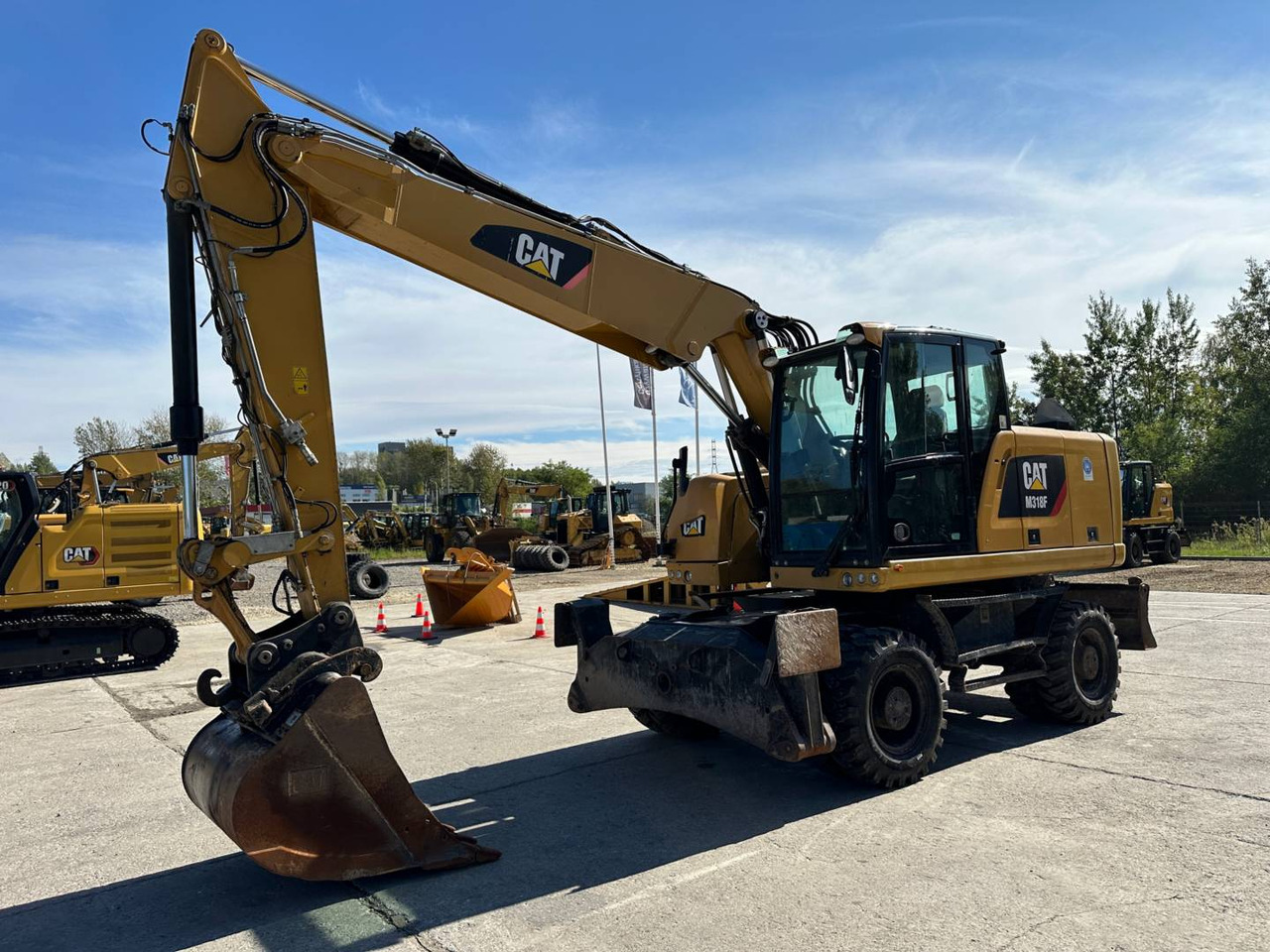 CAT M318F - Chargeuse sur pneus: photos 1 CAT M318F - Chargeuse sur pneus: photos 1