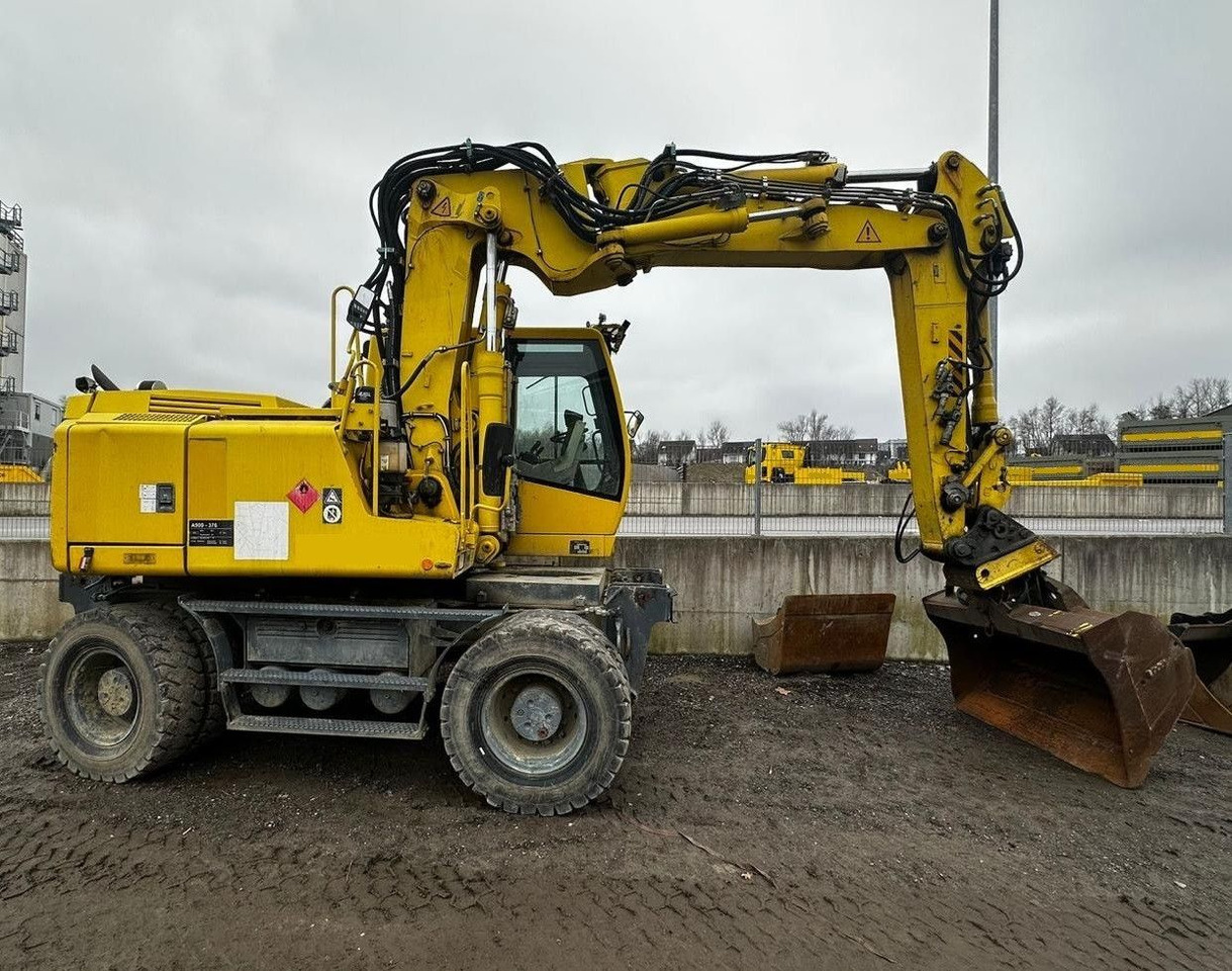 Liebherr A900C ZW Litronic PFS 2, Rail+Road, Gleisbagger - Pelle sur pneus: photos 1 Liebherr A900C ZW Litronic PFS 2, Rail+Road, Gleisbagger - Pelle sur pneus: photos 1