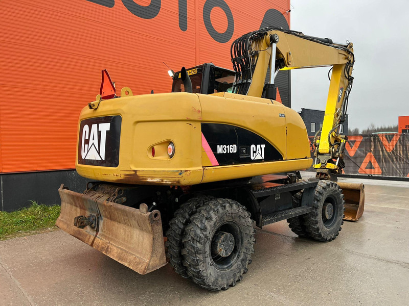 Caterpillar M316D / ROTOTILT/ AC / CENTRAL LUBRICATION / + EXTRA BUCKET - Pelle sur pneus: photos 5 Caterpillar M316D / ROTOTILT/ AC / CENTRAL LUBRICATION / + EXTRA BUCKET - Pelle sur pneus: photos 5
