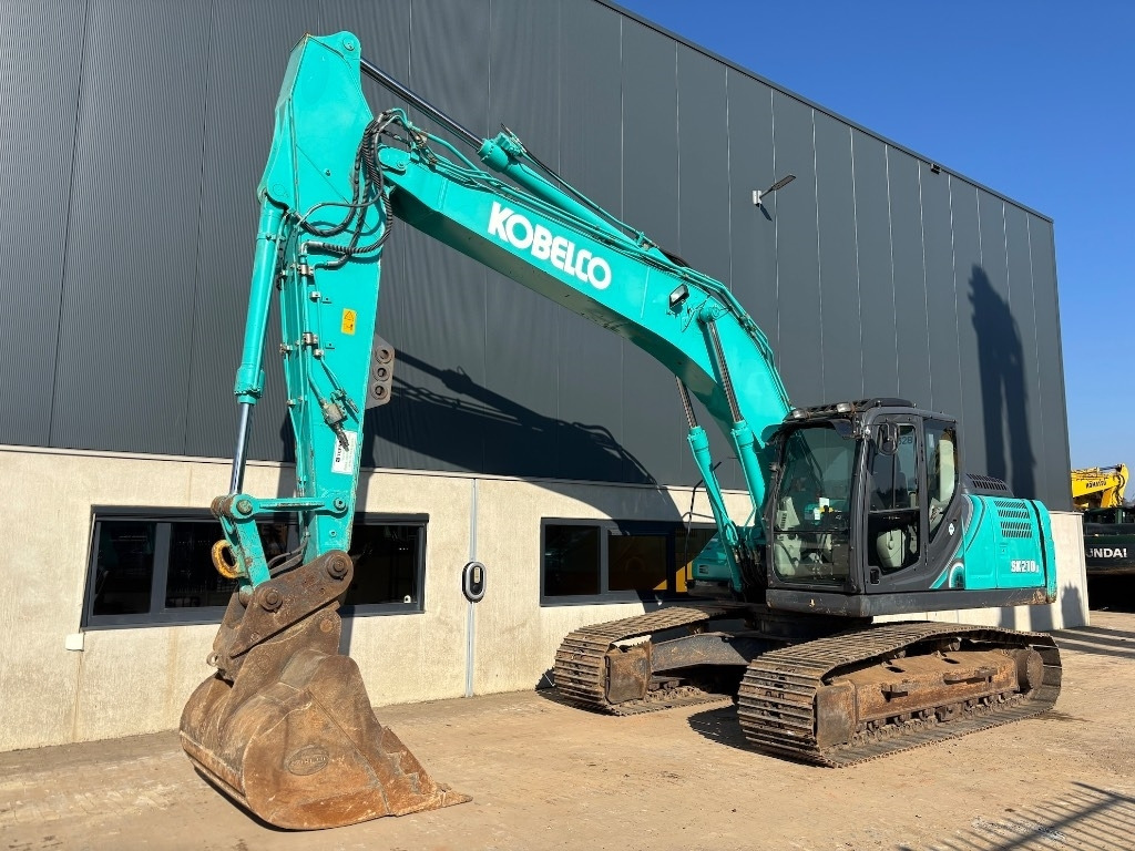 Kobelco SK 210 LC-10 - Kobelco SK210 - Pelle sur chenille: photos 1 Kobelco SK 210 LC-10 - Kobelco SK210 - Pelle sur chenille: photos 1