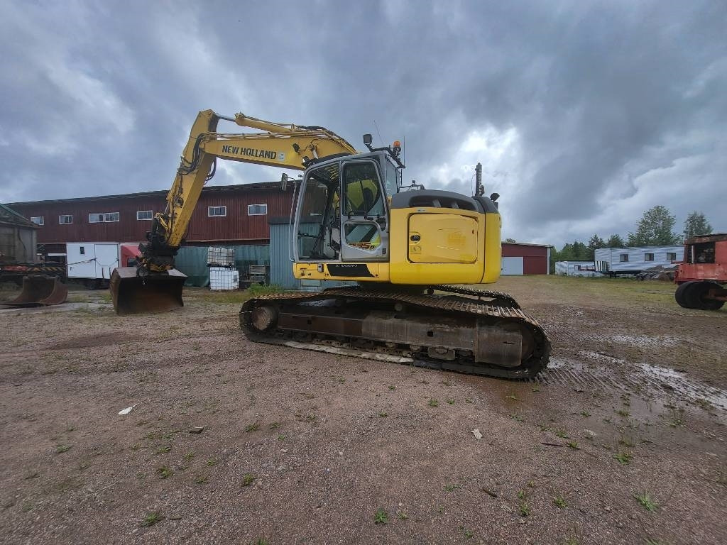 New Holland Kobelco E 235 B SR-2 - Pelle sur chenille: photos 5 New Holland Kobelco E 235 B SR-2 - Pelle sur chenille: photos 5
