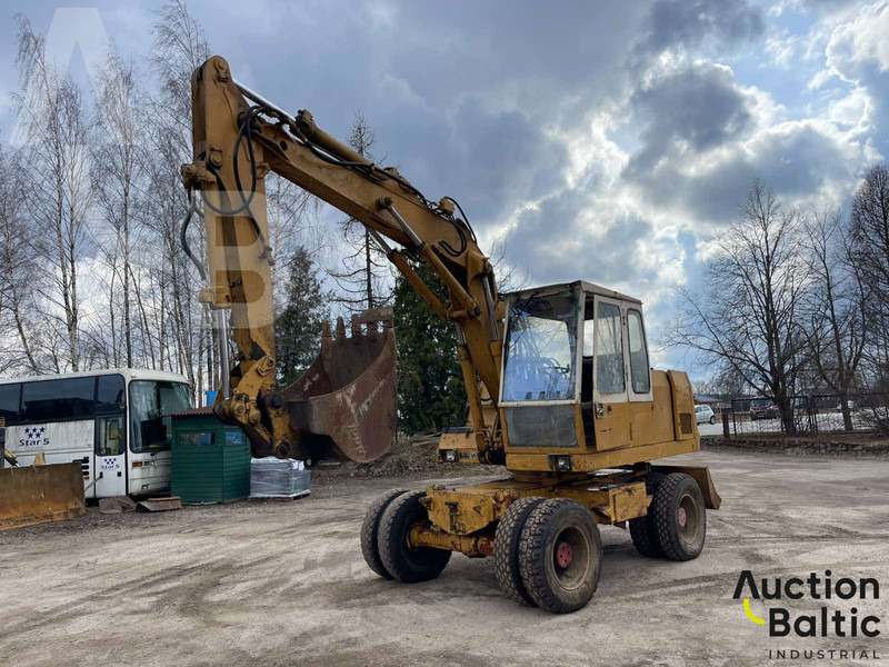 Atlas 1204 - Pelle sur pneus: photos 3 Atlas 1204 - Pelle sur pneus: photos 3