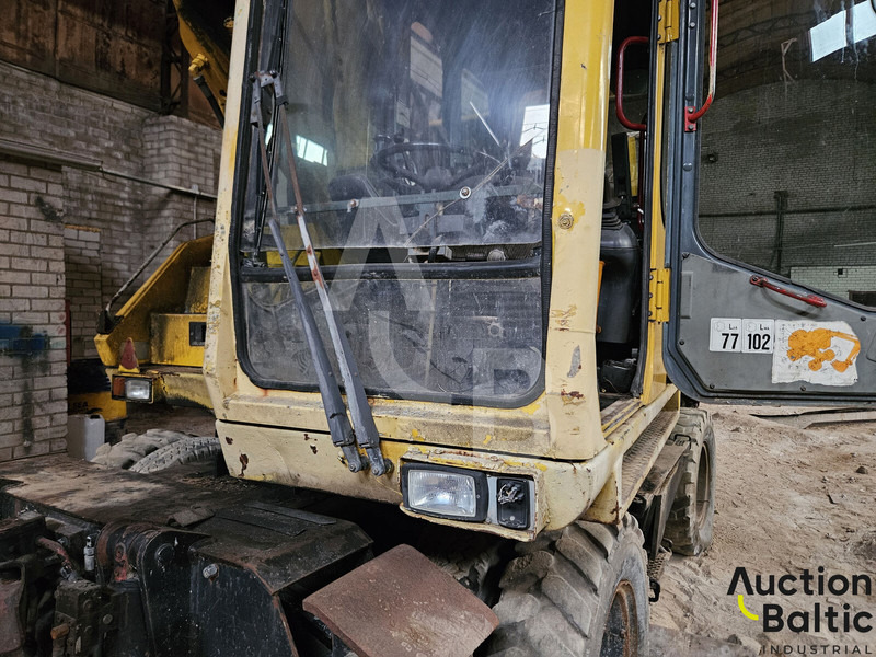 Atlas 1604 - Pelle sur pneus: photos 5 Atlas 1604 - Pelle sur pneus: photos 5