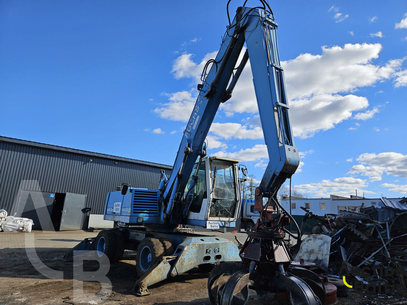 Fuchs MHL 320 - Pelle sur pneus: photos 2 Fuchs MHL 320 - Pelle sur pneus: photos 2