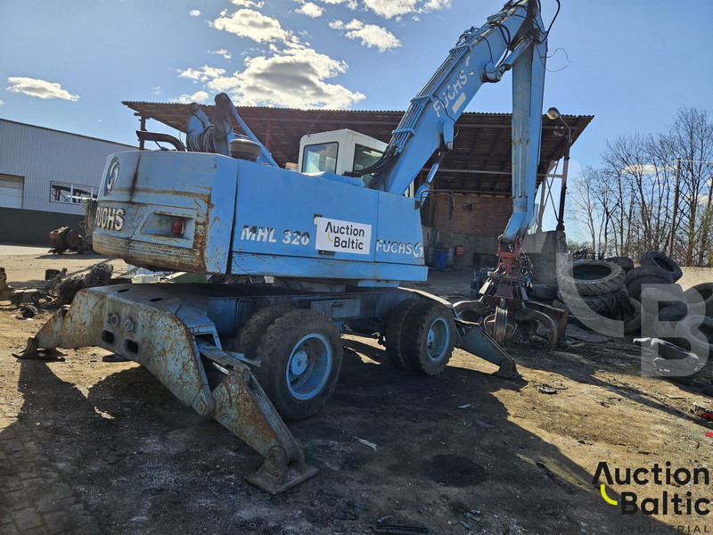 Fuchs MHL 320 - Pelle sur pneus: photos 3 Fuchs MHL 320 - Pelle sur pneus: photos 3