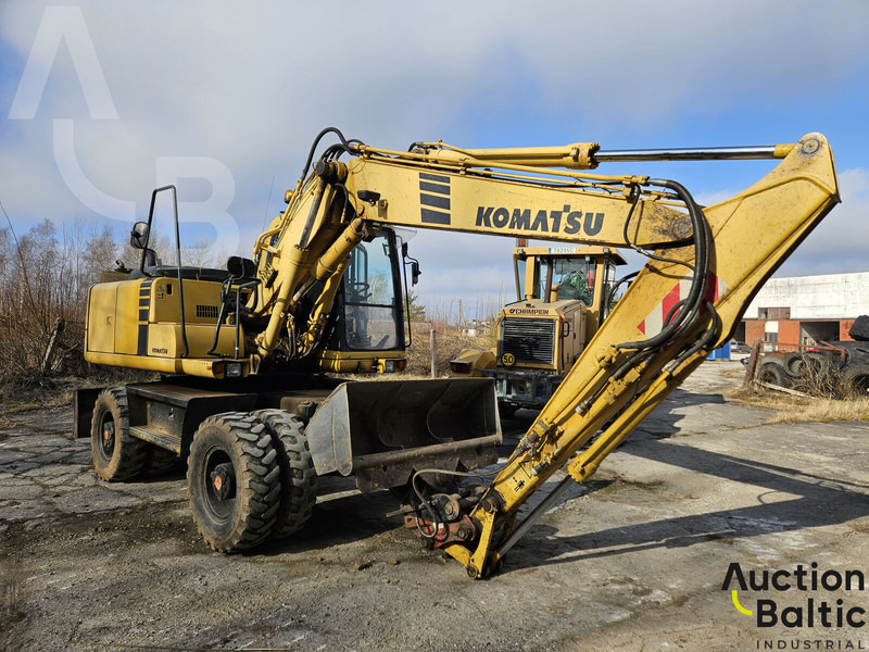 Komatsu PW130ES-6K - Pelle sur pneus: photos 2 Komatsu PW130ES-6K - Pelle sur pneus: photos 2