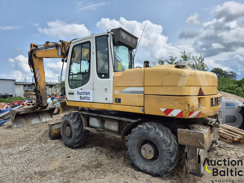 Liebherr A 316 Litronic - Pelle sur pneus: photos 4 Liebherr A 316 Litronic - Pelle sur pneus: photos 4