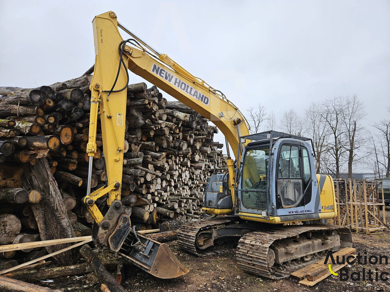 New Holland E 145 - Pelle sur chenille: photos 1 New Holland E 145 - Pelle sur chenille: photos 1