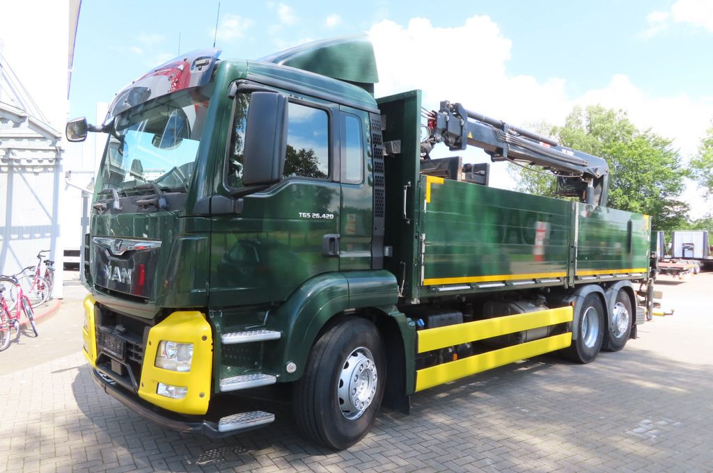 MAN TGX 26.500 6x2 - Baustoff - HIAB Kran - Camion plateau, Camion grue: photos 1 MAN TGX 26.500 6x2 - Baustoff - HIAB Kran - Camion plateau, Camion grue: photos 1