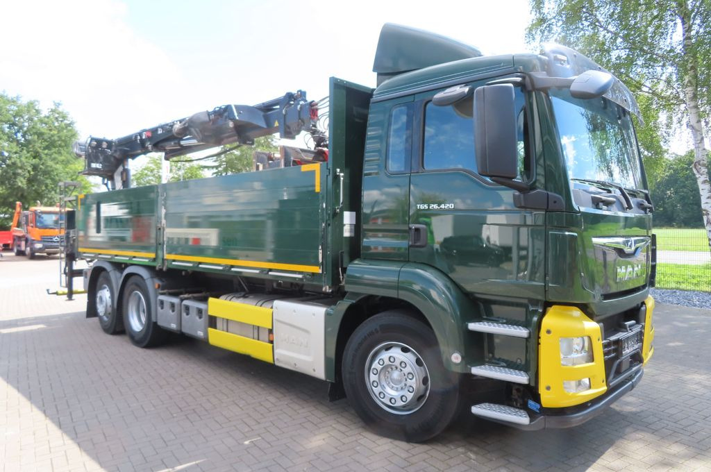 MAN TGX 26.500 6x2 - Baustoff - Kran HIAB - Camion grue, Camion plateau: photos 1 MAN TGX 26.500 6x2 - Baustoff - Kran HIAB - Camion grue, Camion plateau: photos 1
