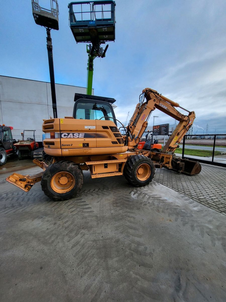 Case WX125 - Pelle sur pneus: photos 5 Case WX125 - Pelle sur pneus: photos 5